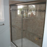 Tiled Shower and Tub Surround with Glass Doors